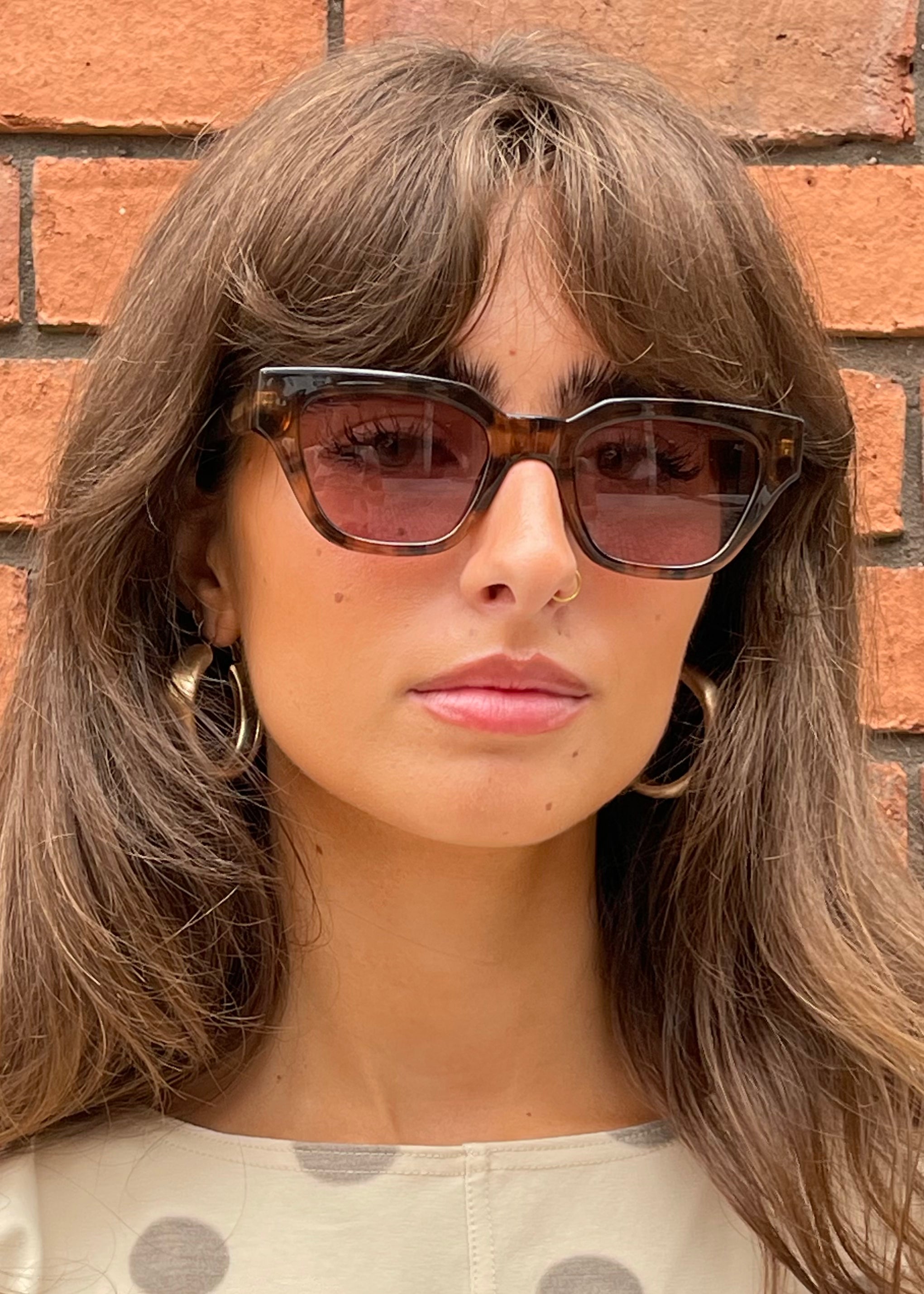 A.Kjaerbede Sunglasses Kaws Coquina Model Front