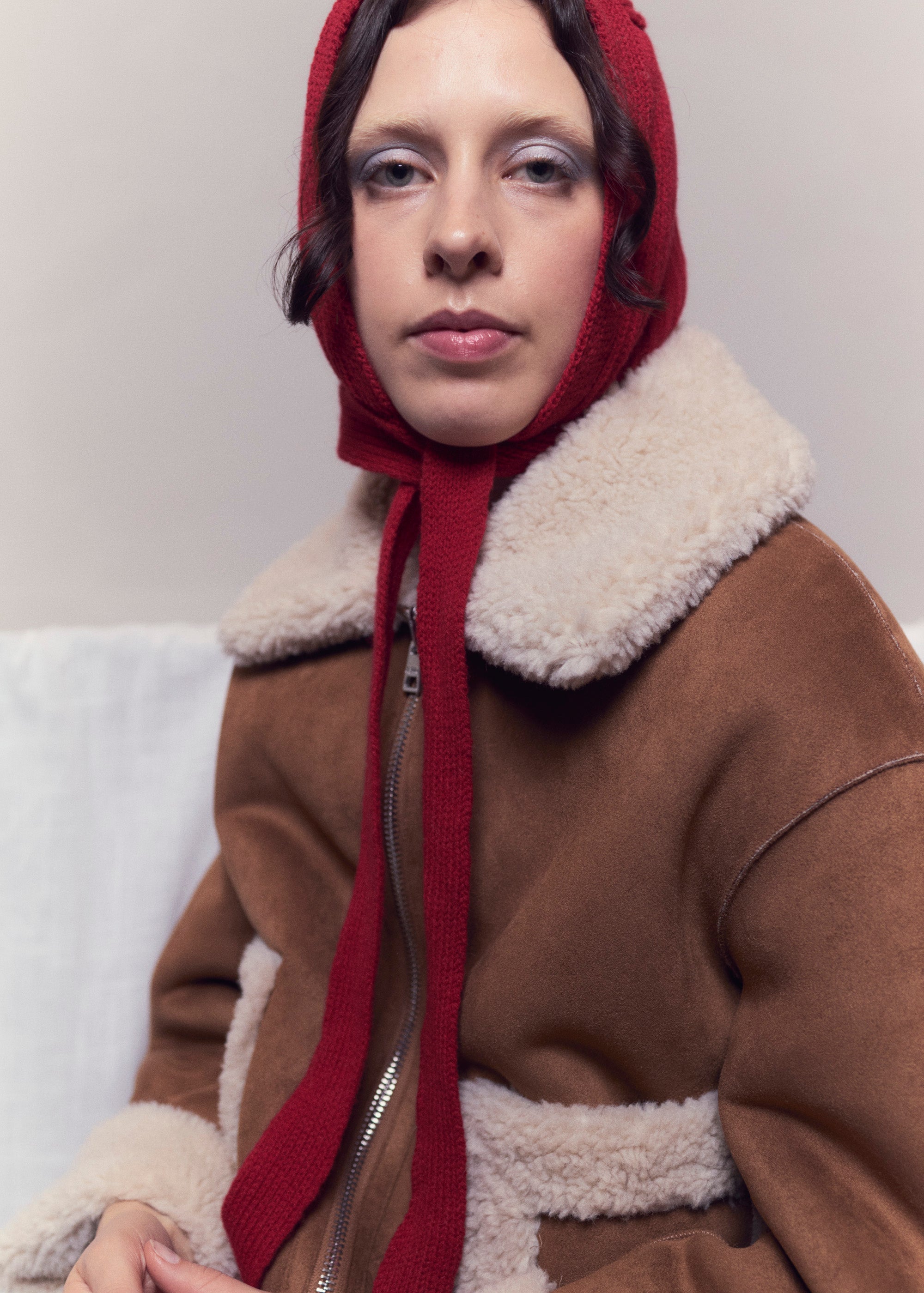 Creative campaign vera jacket sandwith red bonnet