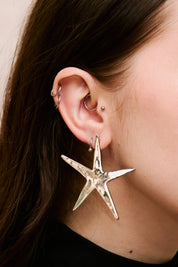 Eyland star earrings product shot