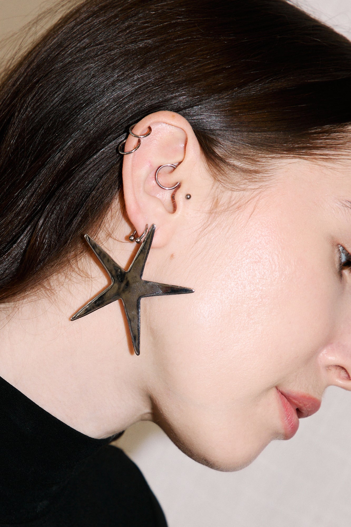 Eyland star earrings product shot