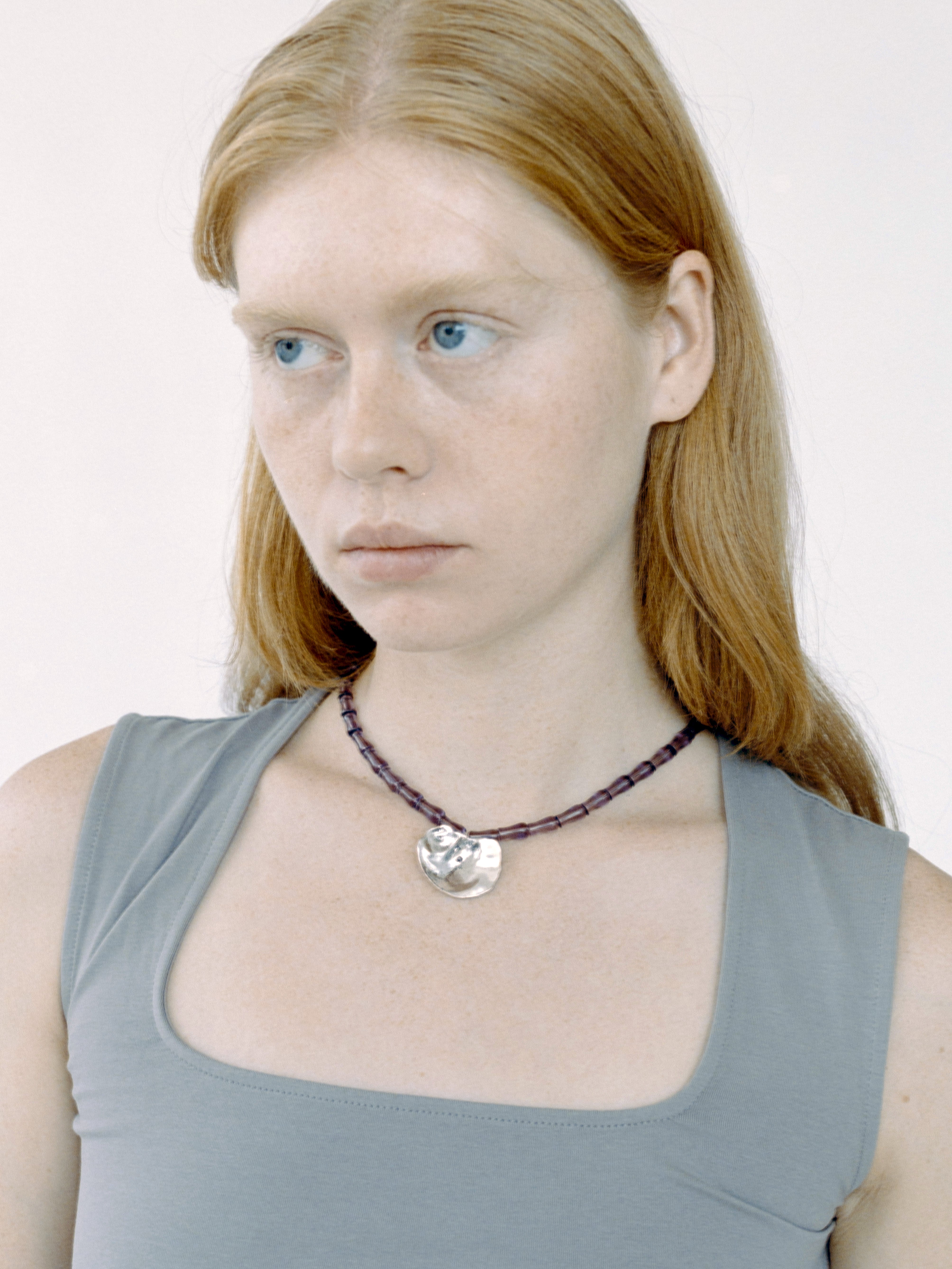 Lovethanks token necklace brand imagery