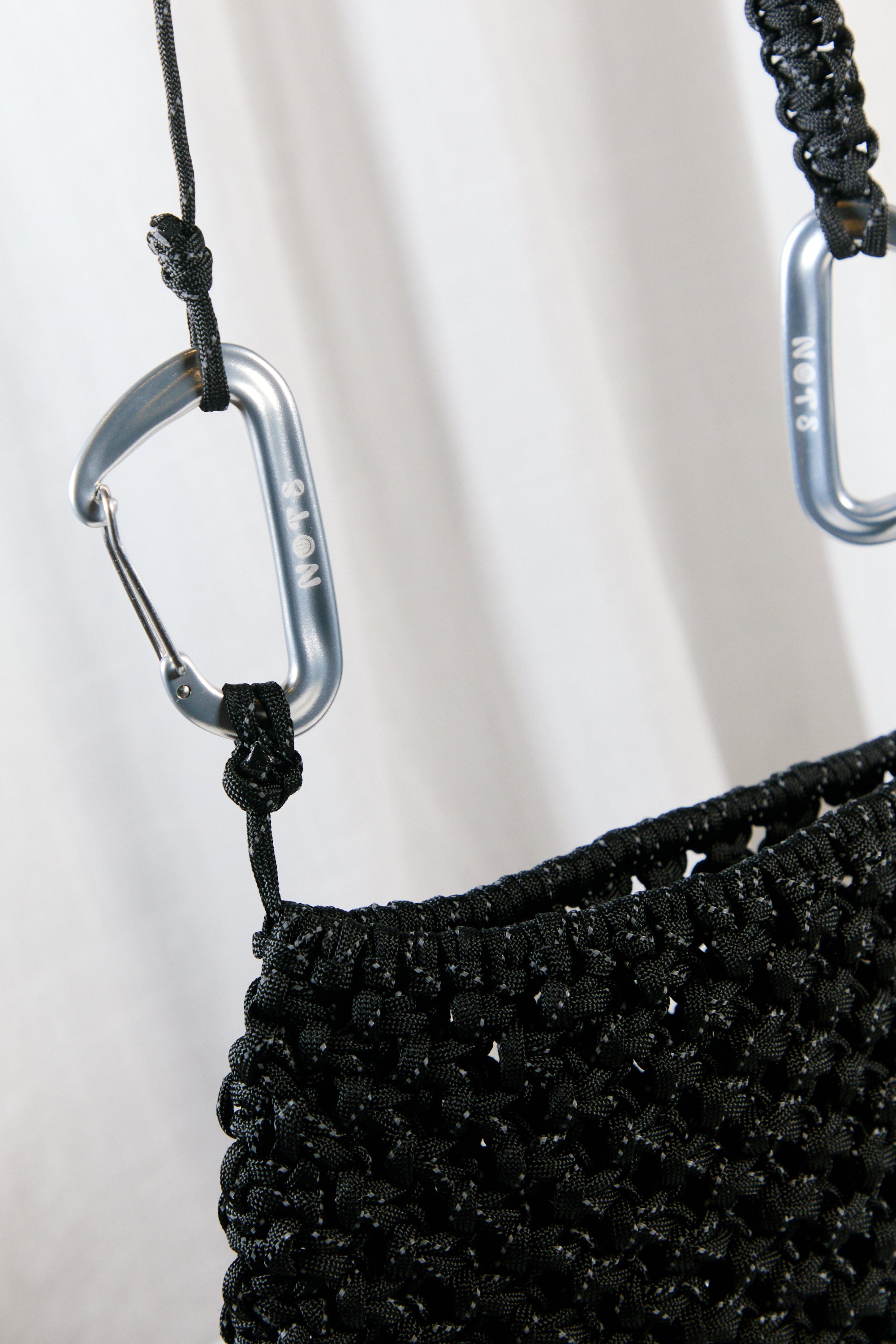 Nots daily bag in black reflective