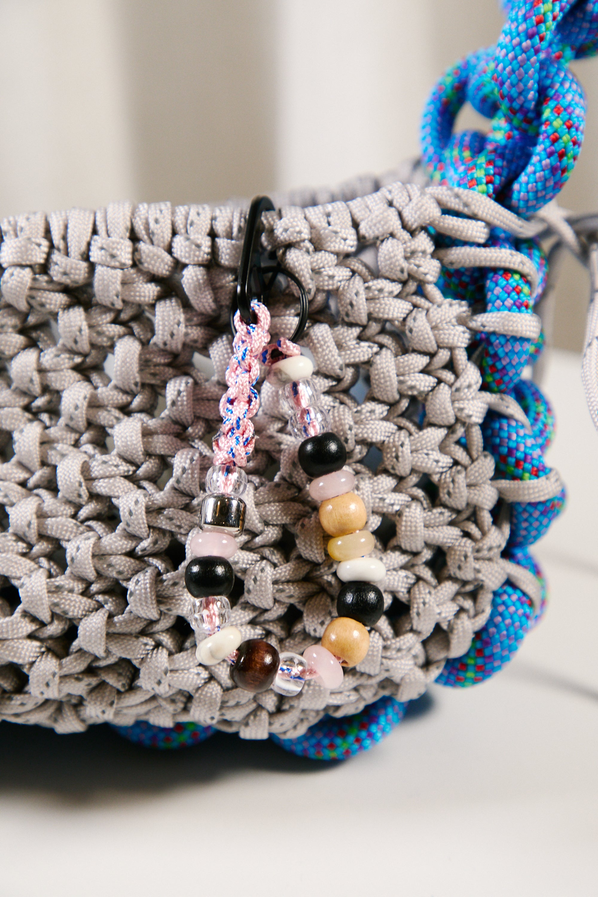 Nots friday sling bag in blue and grey reflective