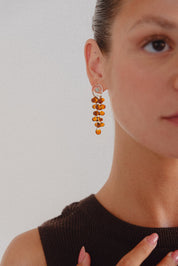 Posedonia Clear and Amber Earrings Brand Image