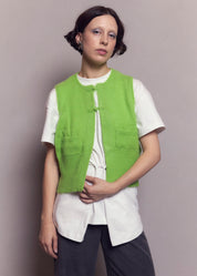 norah store aw24 campaign amber beams boy china lime green vest top