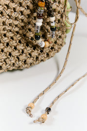 Nots friday sling bag in green and beige 