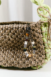 Nots friday sling bag in green and beige 