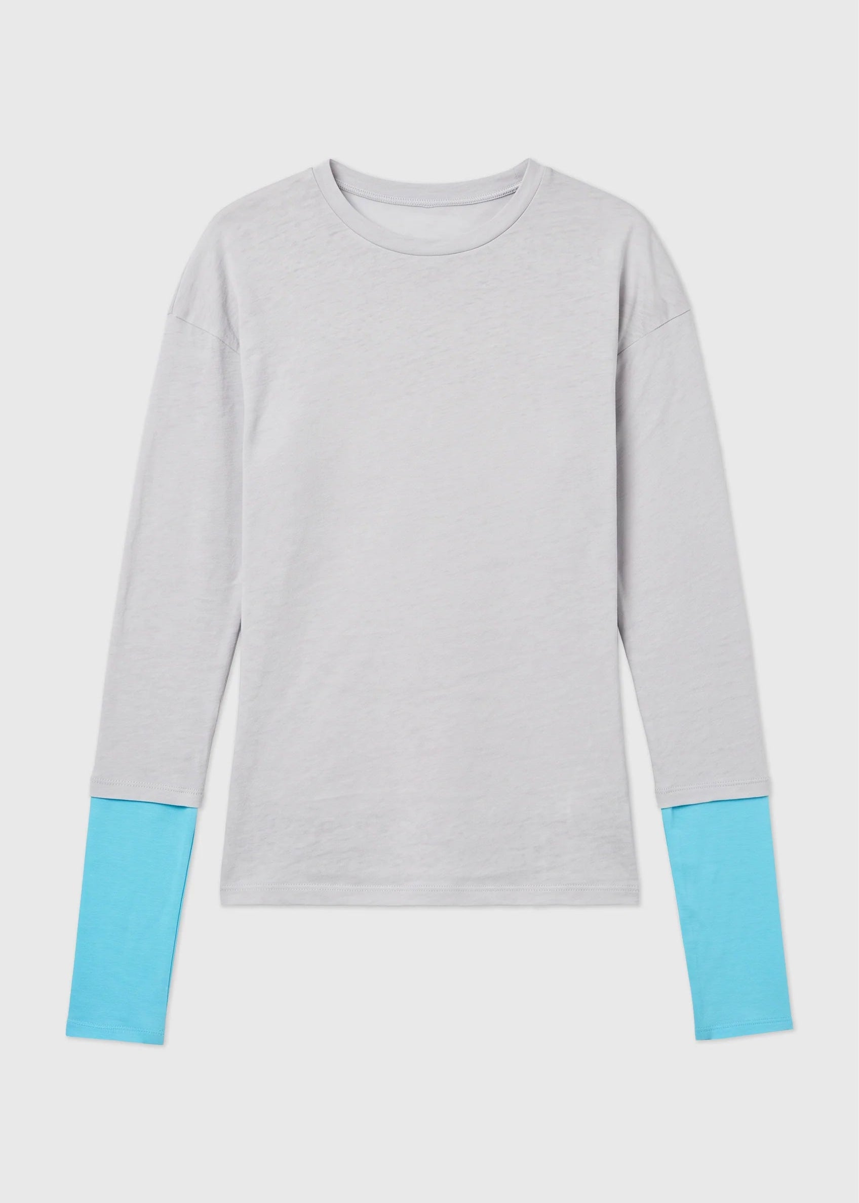 A light gray long-sleeve crewneck top with contrasting light blue cuffs, displayed flat against a light gray background.