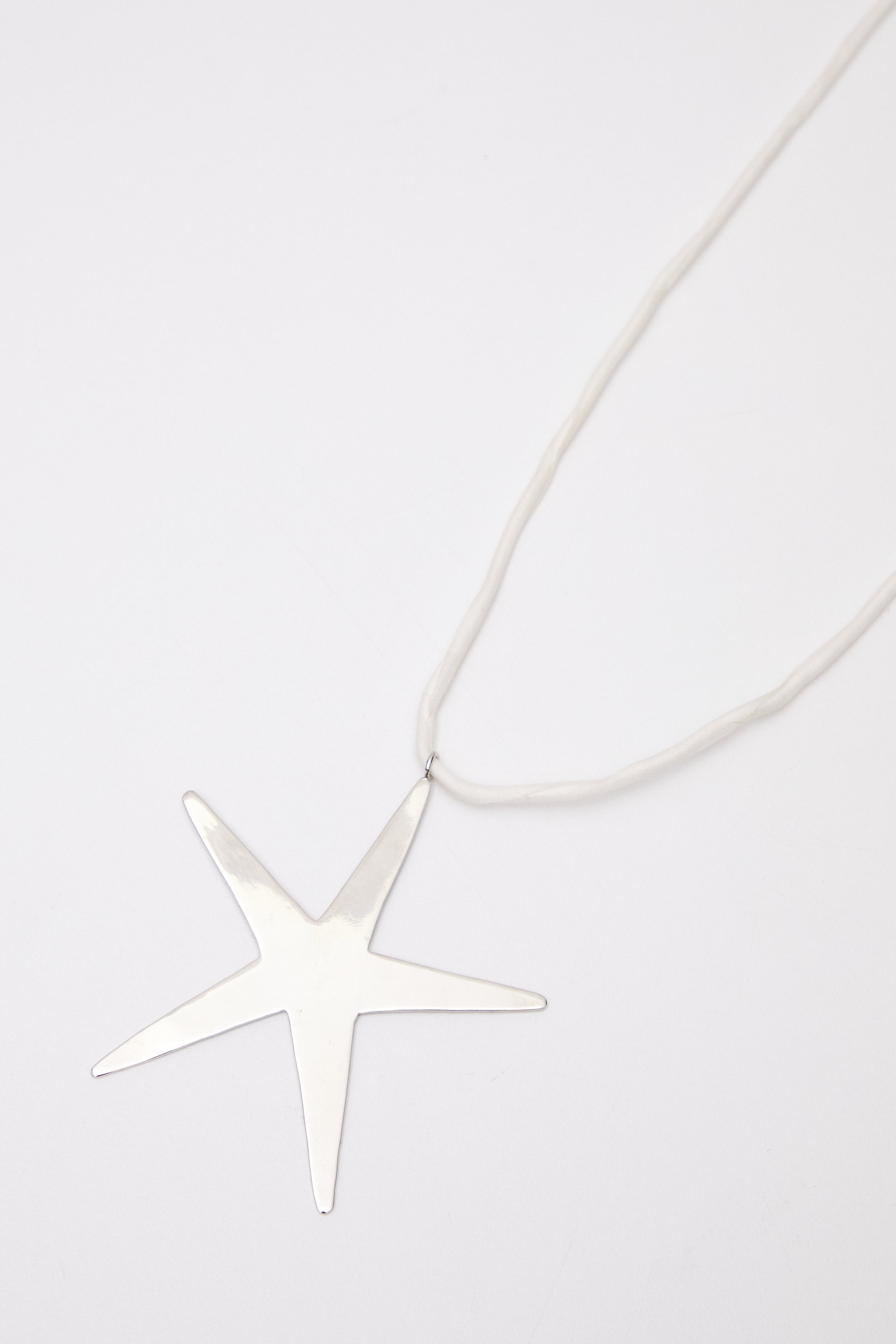 eyland star necklace close detail