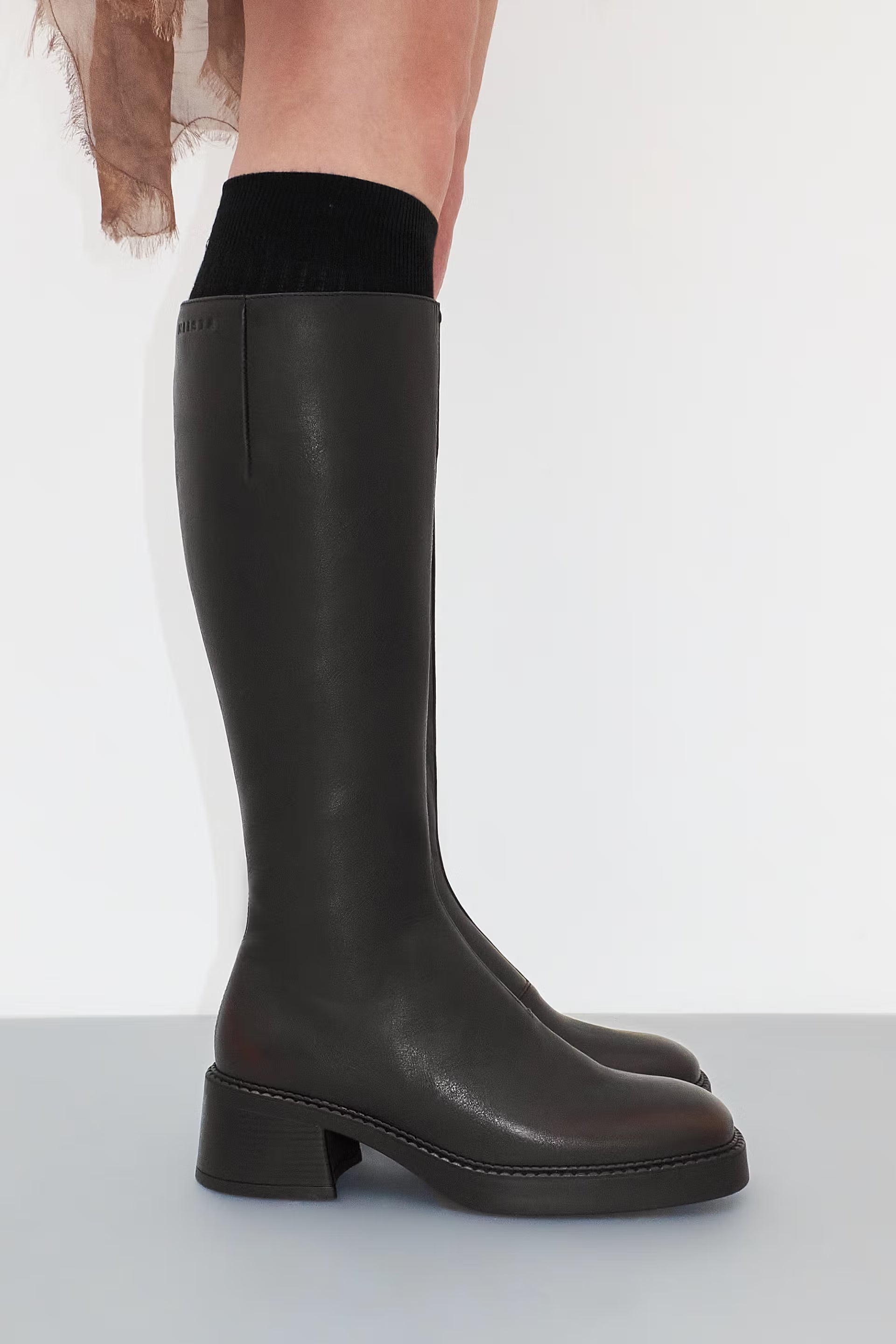 miistayumibrushedbrownleatherboots3.avif