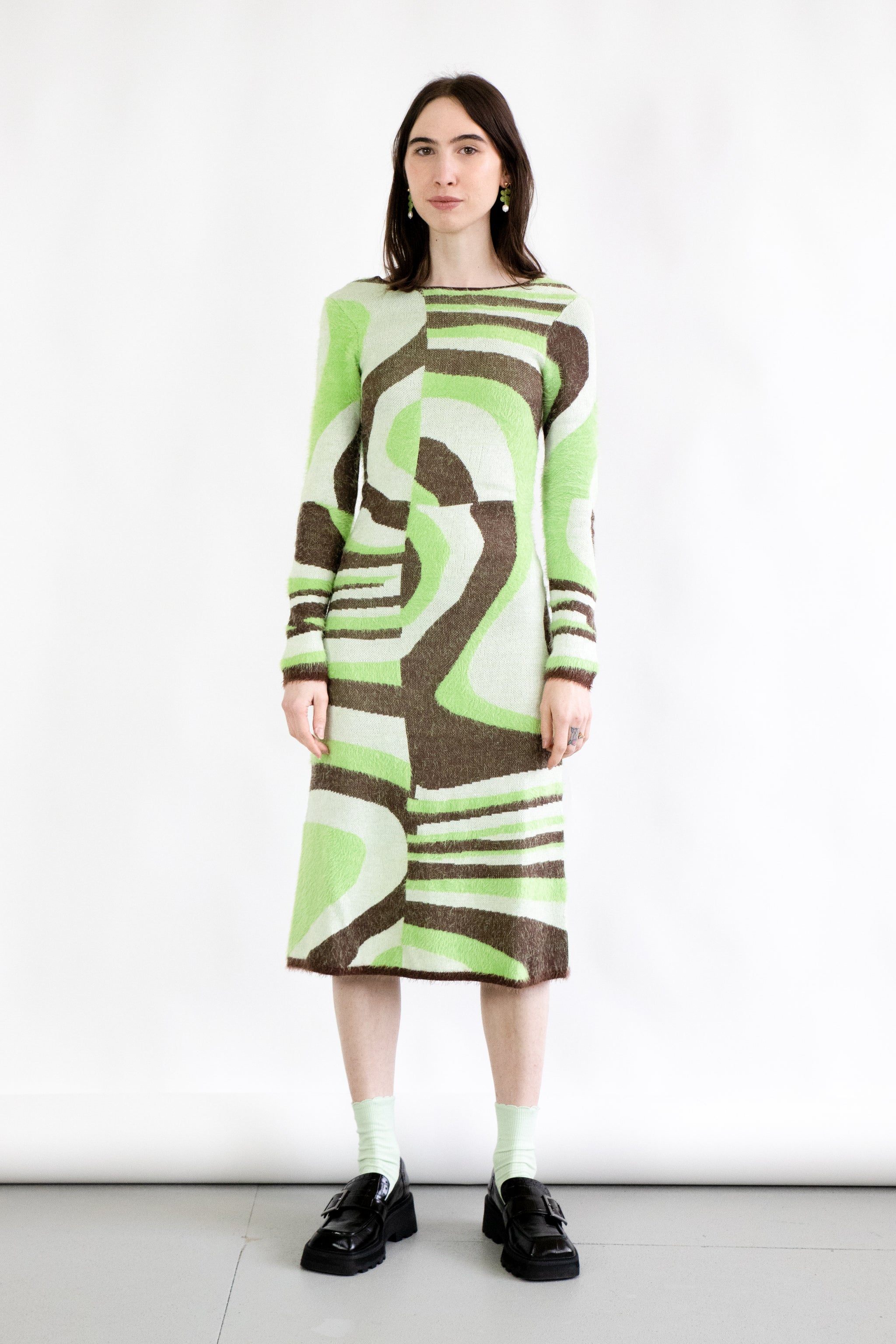 green hockney dress GALAXY HOCKNEY House of Sunny's iconic green dress with new swirl motif. In stock and ready to ship, snag one now! . . . #houseofsunny #cypress #hockney #newarrival #limitedrelease #limitedquantity #limitedstock #